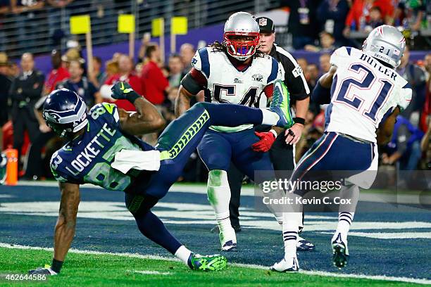 Malcolm Butler of the New England Patriots intercepts a pass by Russell Wilson of the Seattle Seahawks intended for Ricardo Lockette late in the...