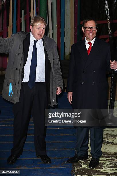 Boris Johnson and Richard Desmond attend a photocall at The Shadwell Community Project on January 14, 2014 in London, England.