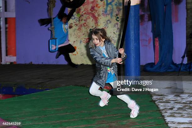 Children play in the adventure playground at a photocall at The Shadwell Community Project on January 14, 2014 in London, England.