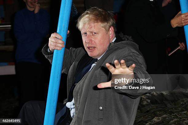 Boris Johnson attends a photocall at The Shadwell Community Project on January 14, 2014 in London, England.