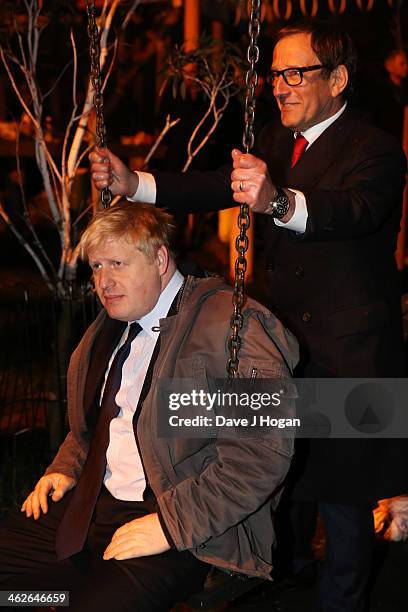 Boris Johnson and Richard Desmond attend a photocall at The Shadwell Community Project on January 14, 2014 in London, England.