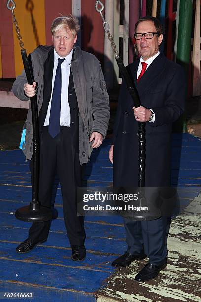 Boris Johnson and Richard Desmond attend a photocall at The Shadwell Community Project on January 14, 2014 in London, England.