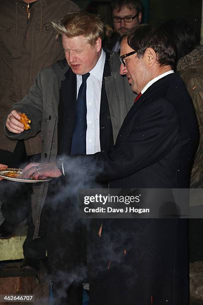 Boris Johnson and Richard Desmond attend a photocall at The Shadwell Community Project on January 14, 2014 in London, England.