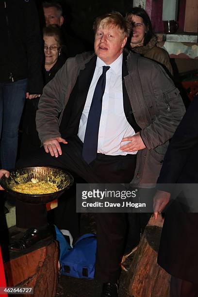 Boris Johnson attends a photocall at The Shadwell Community Project on January 14, 2014 in London, England.