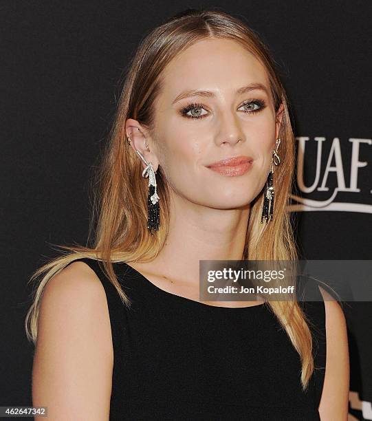 Dylan Penn arrives at the 16th Annual Warner Bros. And InStyle Post-Golden Globe Party at The Beverly Hilton Hotel on January 11, 2015 in Beverly...