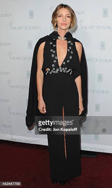 Actress Dawn Olivieri arrives at The Art Of Elysium 8th Annual Heaven Gala at Hangar 8 on January 10, 2015 in Santa Monica, California.