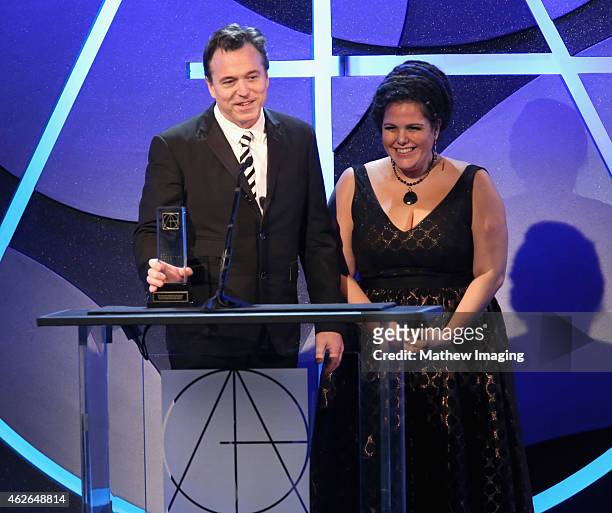 Production Designer Derek McLane with award for Awards or Event Special and Art Director Gloria Lamb onstage during the 19th Annual Art Directors...