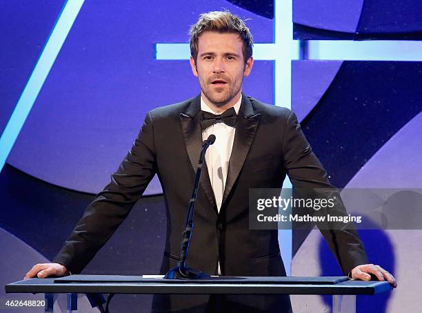 Presenter Matt Ryan speaks onstage during the 19th Annual Art Directors Guild Excellence In Production Design Awards at The Beverly Hilton Hotel on...