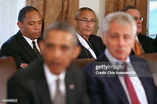 White House Deputy Chief of Staff Rob Nabors, advisor John Podesta and Director of the National Economic Council Gene Sperling sit behind U.S....