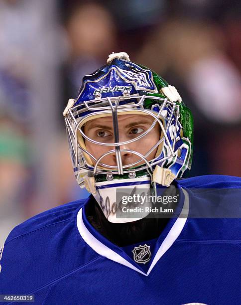 Goalie Joacim Eriksson of the Vancouver Canucks during the pre-game warmup prior to NHL action against the Tampa Bay Lightning on January 01, 2014 at...