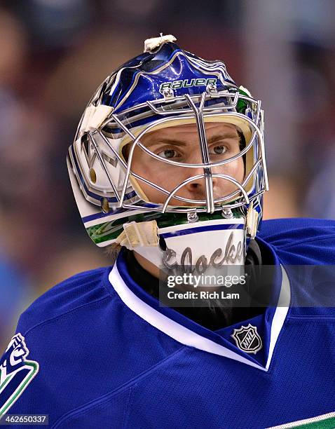 Goalie Joacim Eriksson of the Vancouver Canucks during the pre-game warmup prior to NHL action against the Tampa Bay Lightning on January 01, 2014 at...