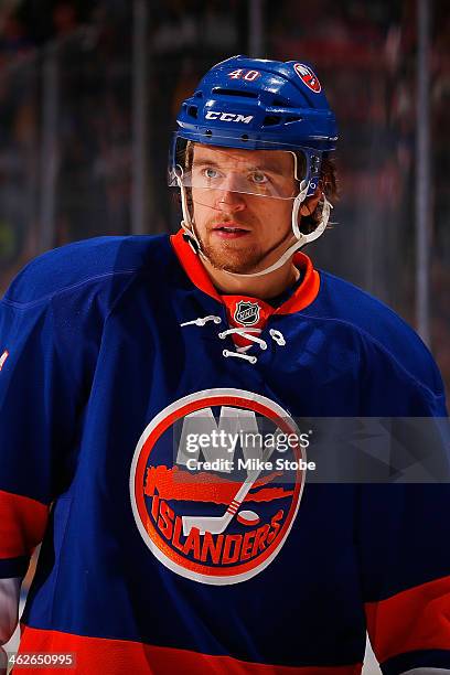 Michael Grabner of the New York Islanders skates against the New Jersey Devils at Nassau Veterans Memorial Coliseum on December 28, 2013 in...