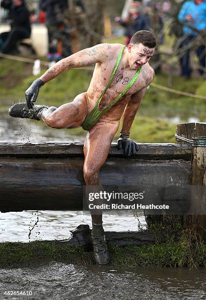 Competitor takes part in a mankini during the Tough Guy Challenge at South Perton Farm on February 1, 2015 in Wolverhampton, England.