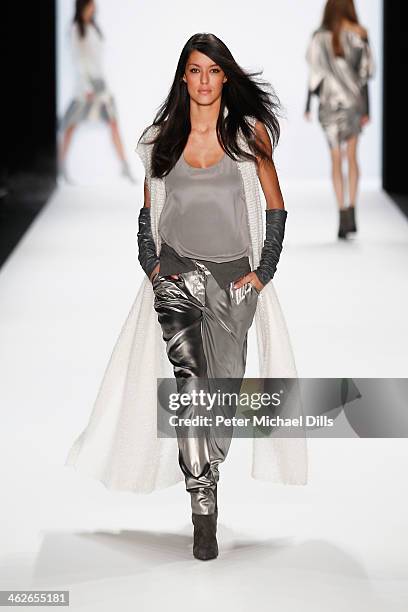 Rebecca Mir walks the runway at the Riani show during Mercedes-Benz Fashion Week Autumn/Winter 2014/15 at Brandenburg Gate on January 14, 2014 in...