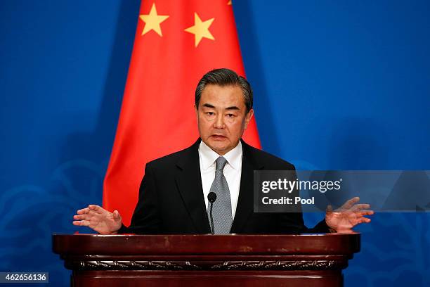 Chinese Foreign Minister Wang Yi attends the press conference after the 13th trilateral meeting of Foreign Ministers from Russia, India and China at...