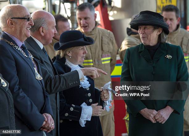 Queen Elizabeth II greets guests as she formally opens the new South Lynn Fire Station on February 2, 2015 in King's Lynn, Norfolk, England.