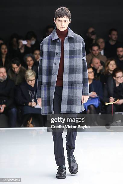 Model walks the runway during the Z Zegna show as part of Milan Fashion Week Menswear Autumn/Winter 2014 on January 14, 2014 in Milan, Italy.