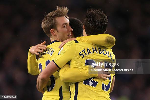 Christian Eriksen of Spurs celebrates victory with his teammates during the Capital One Cup Semi-Final Second Leg match between Sheffield United and...