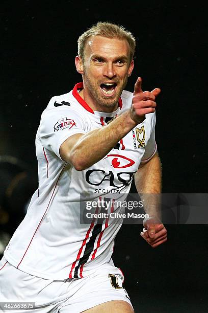 Luke Chadwick of Milton Keynes celebrates after scoring the opening goal during the Budweiser FA Cup third round replay match between Milton Keynes...