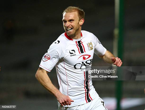 Luke Chadwick of Milton Keynes celebrates after scoring the opening goal during the Budweiser FA Cup third round replay match between Milton Keynes...