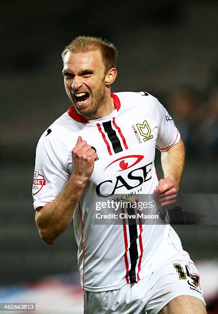 Luke Chadwick of Milton Keynes celebrates after scoring the opening goal during the Budweiser FA Cup third round replay match between Milton Keynes...