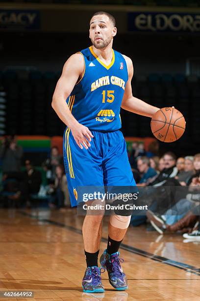 Mychel Thompson of the Santa Cruz Warriors dribbles the basketball against the Reno Bighorns during an NBA D-League game on January 30, 2015 at the...