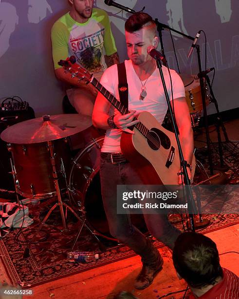 Chase Bryant preforms during CMT After Midnight After Party and Super Bowl Sunday With Big & Rich At Dierks Bentley's Whisky Row on February 1, 2015...