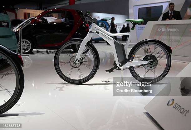 The Daimler AG Mercedes-Benz Smart Ebike is displayed during the 2014 North American International Auto Show in Detroit, Michigan, U.S., on Tuesday,...