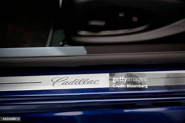 The General Motors Co. Cadillac logo is seen on a 2015 ATS compact luxury coupe after it is unveiled during the 2014 North American International...