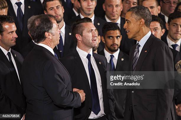 Galaxy head coach, Bruce Arena and forward Robbie Keane speak with President Barack Obama as he hosts the National Hockey League champions Los...