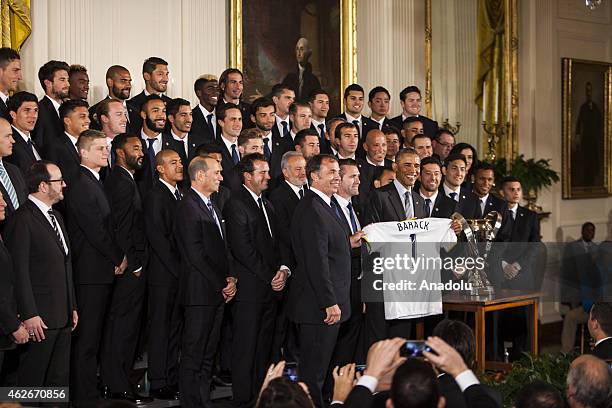 President Barack Obama poses for photographs with Major League Soccer champions Los Angeles Galaxy in the East Room of the White House February 2,...