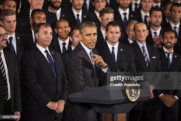 President Barack Obama delivers remarks while hosting the National Hockey League champions Los Angeles Kings and the Major League Soccer champions...