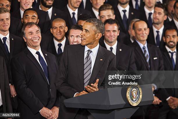 President Barack Obama delivers remarks while hosting the National Hockey League champions Los Angeles Kings and the Major League Soccer champions...