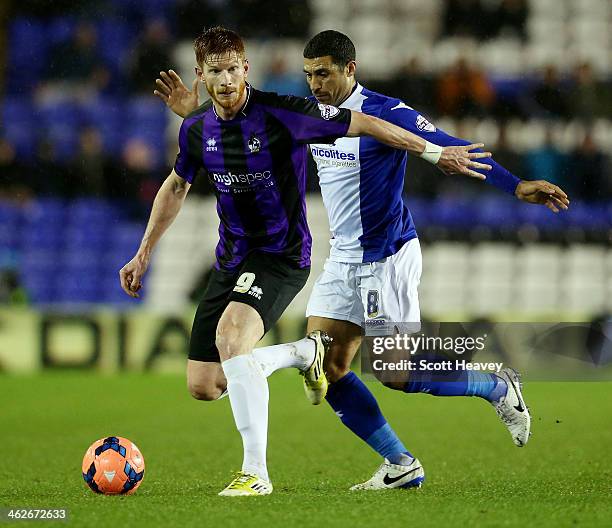 Matt Harrold of Bristol Rovers in actionw ith Hayden Mullins of Birmingham during the FA Cup Third Round match between Birmingham City and Bristol...