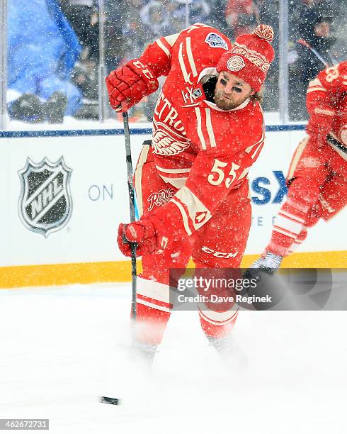 Niklas Kronwall of the Detroit Red Wings shoots the puck during warm-ups before the Bridgestone NHL Winter Classic game against the Toronto Maple...