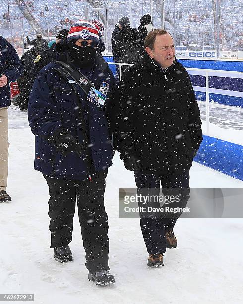 Commissioner Gary Betman walks by the rink before the Bridgestone NHL Winter Classic game between the Detroit Red Wings and the Toronto Maple Leafs...