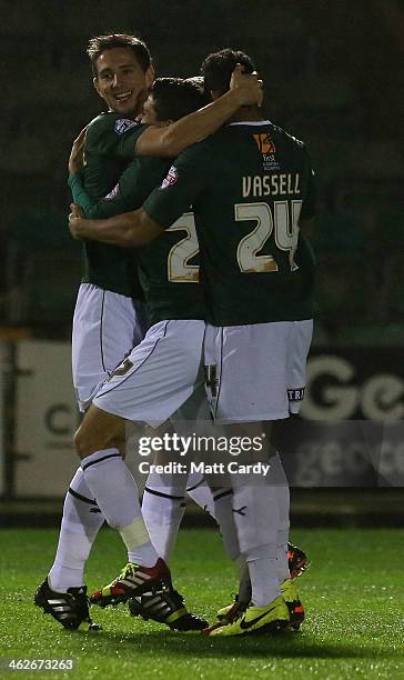 Andres Gurrieri of Plymouth Argyle celebrates with his team-mates after scoring the opening goal during the FA Cup third round replay between...