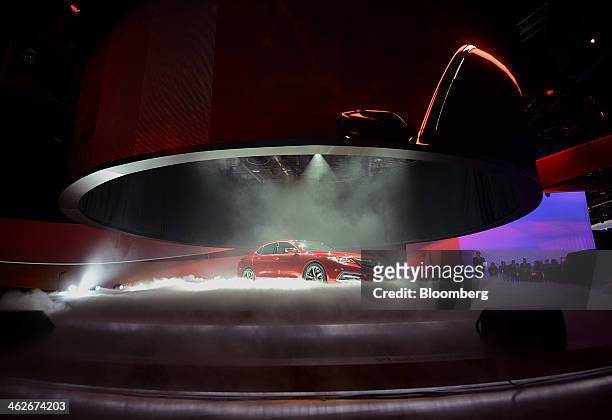 The 2015 Honda Motor Co. Acura TLX vehicle is unveiled during the 2014 North American International Auto Show in Detroit, Michigan, U.S., on Tuesday,...
