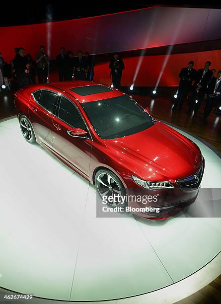 The 2015 Honda Motor Co. Acura TLX vehicle is displayed after being unveiled during the 2014 North American International Auto Show in Detroit,...