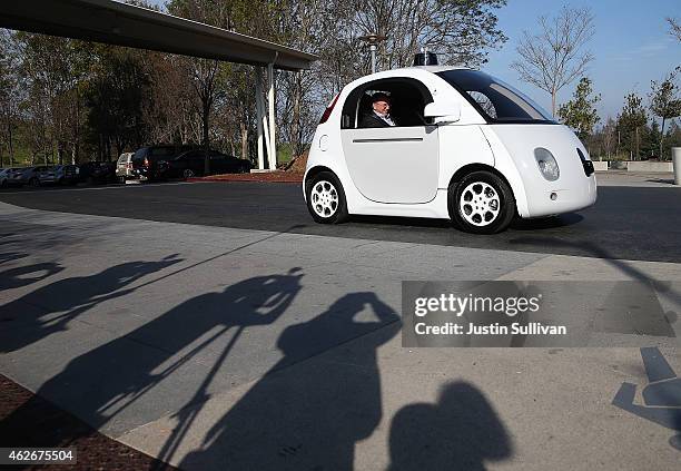 Google Chairman Eric Schmidt sits in a Google self-driving car at the Google headquarters on February 2, 2015 in Mountain View, California. U.S....