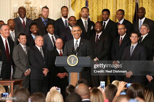 President Barack Obama welcomes the 2012-2013 National Basketball Association champion Miami Heat to the White House for a visit on January 14, 2014...