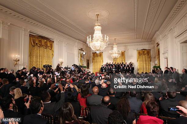 President Barack Obama welcomes the 2012-2013 National Basketball Association champion Miami Heat to the White House for a visit on January 14, 2014...