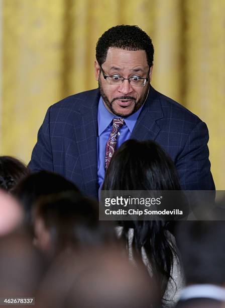 Author and Georgetown University professor Michael Eric Dyson talks with actor Gabrielle Union before the start of an event with the NBA champion...