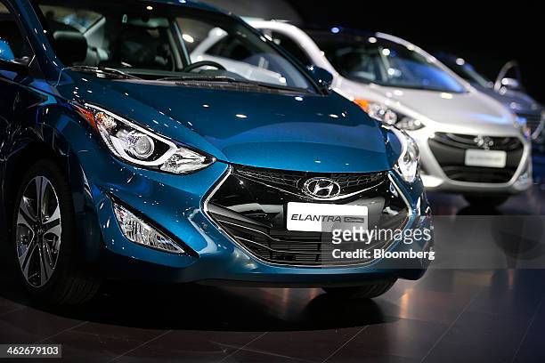 The Hyundai Motor Co. Elantra Coupe vehicle is displayed during the 2014 North American International Auto Show in Detroit, Michigan, U.S., on...