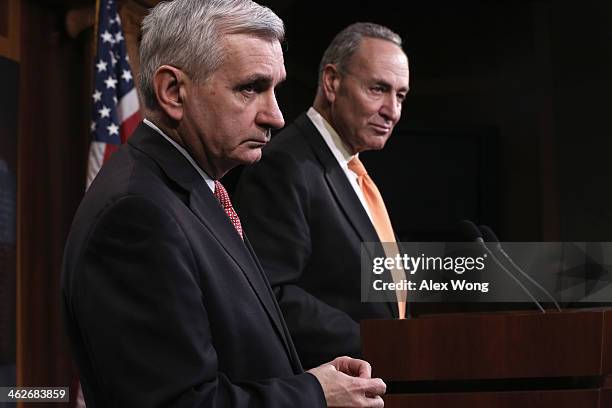 Sen. Jack Reed and Sen. Charles Schumer speak to members of the media on unemployment insurance on January 14, 2014 on Capitol Hill in Washington,...