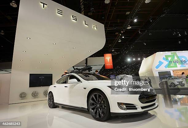 The Tesla Motors Inc. Model S sedan is displayed during the 2014 North American International Auto Show in Detroit, Michigan, U.S., on Tuesday, Jan....