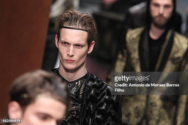 Models walk the runway during the Roberto Cavalli show as a part of Milan Fashion Week Menswear Autumn/Winter 2014 on January 14, 2014 in Milan,...
