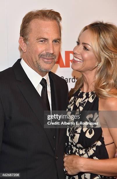 Actor Kevin Costner and Christine Baumgartner arrive to AARP The Magazine's 14th Annual Movies For Grownups Awards Gala at the Beverly Wilshire Four...