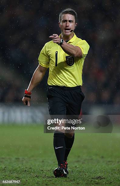 Referee James Adcock in action during the FA Cup with Budweiser Third Round Replay between Milton Keynes Dons and Wigan Athletic at Stadium mk on...