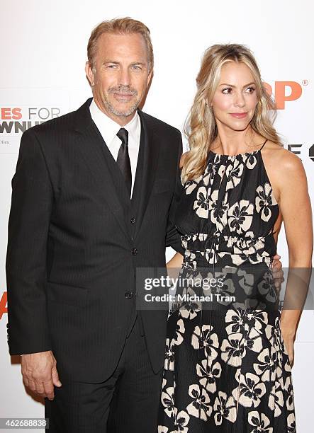 Kevin Costner and his wife Christine Baumgartner arrive at the AARP 14th Annual "Movies For Grownups" Awards Gala held at the Beverly Wilshire Four...